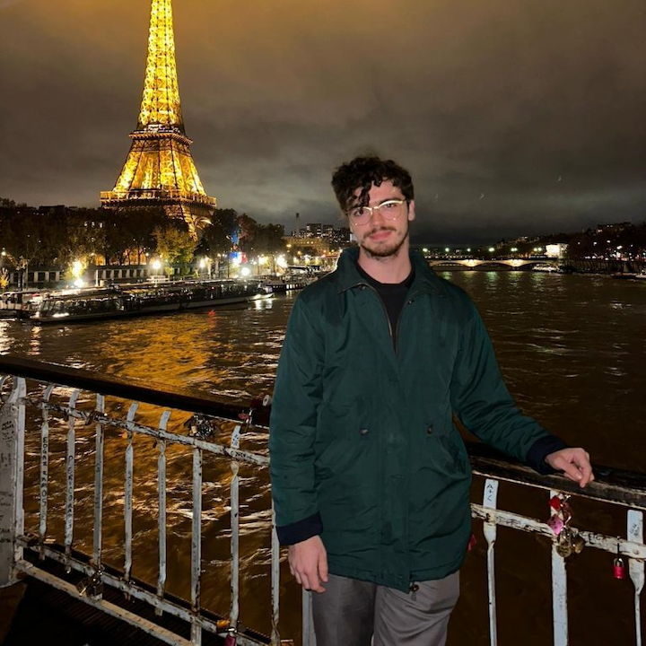 A photo of Brendan Cole with the Eiffel Tower in the background.